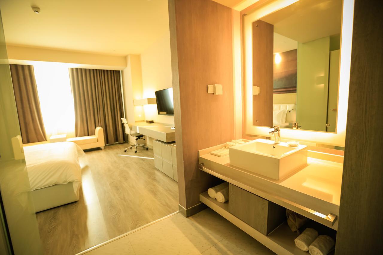 Metropolo Jin Jiang Hotels Turpan Administrative The Heart Of Pai ภายนอก รูปภาพ